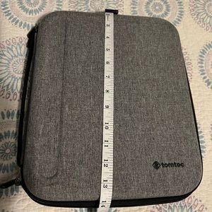 Tomtoc iPad case, light use. Smoke-free home. No pet exposure.